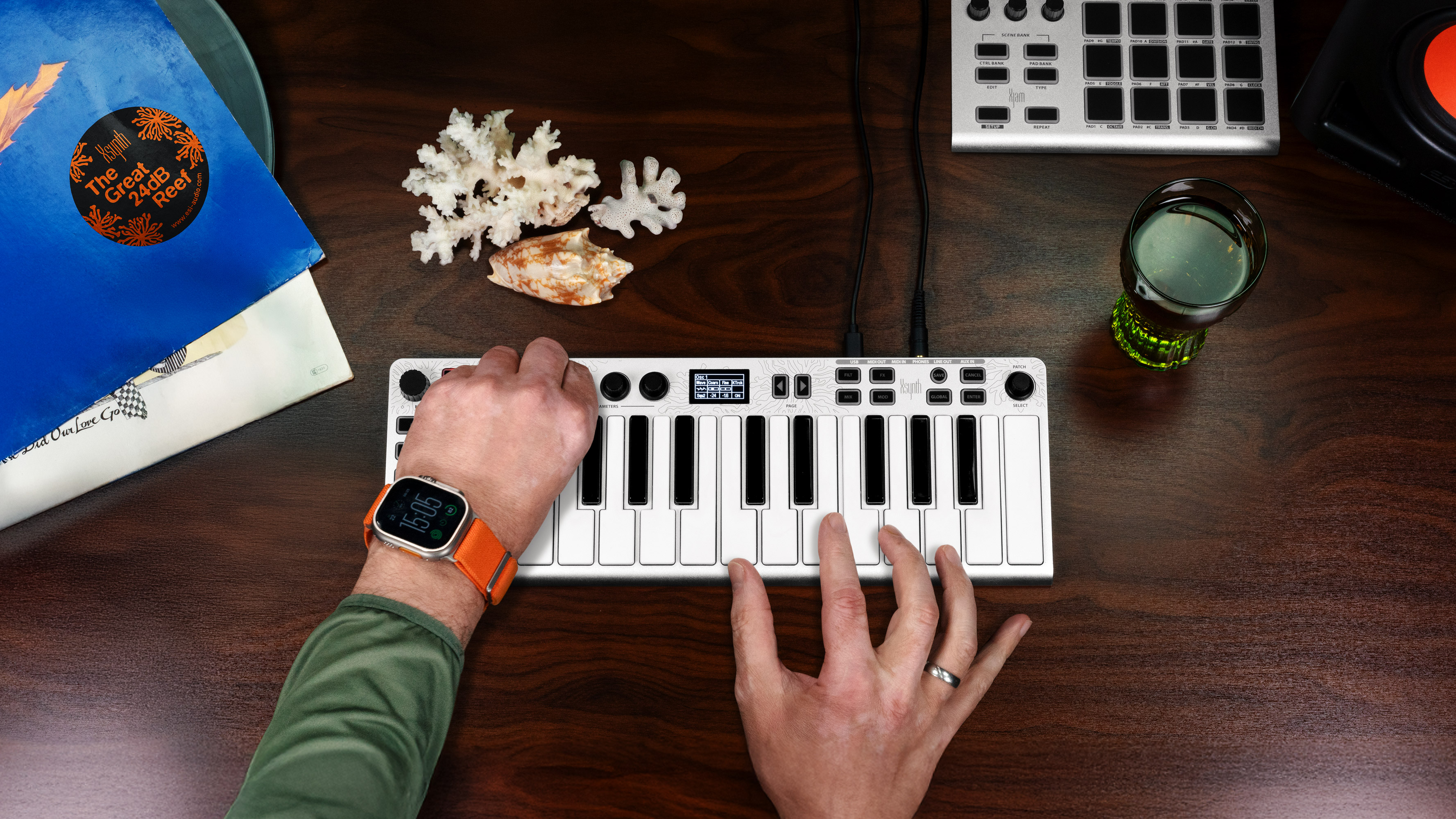 Musician playing ESI Xsynth – compact studio synthesizer